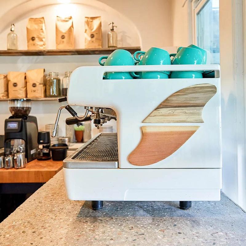 Interior, a coffee machine at a bar.